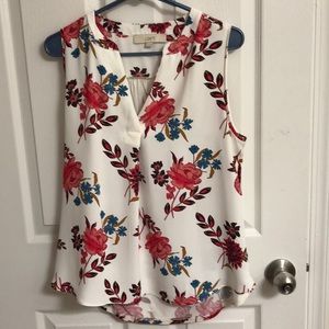 White floral sleeveless blouse